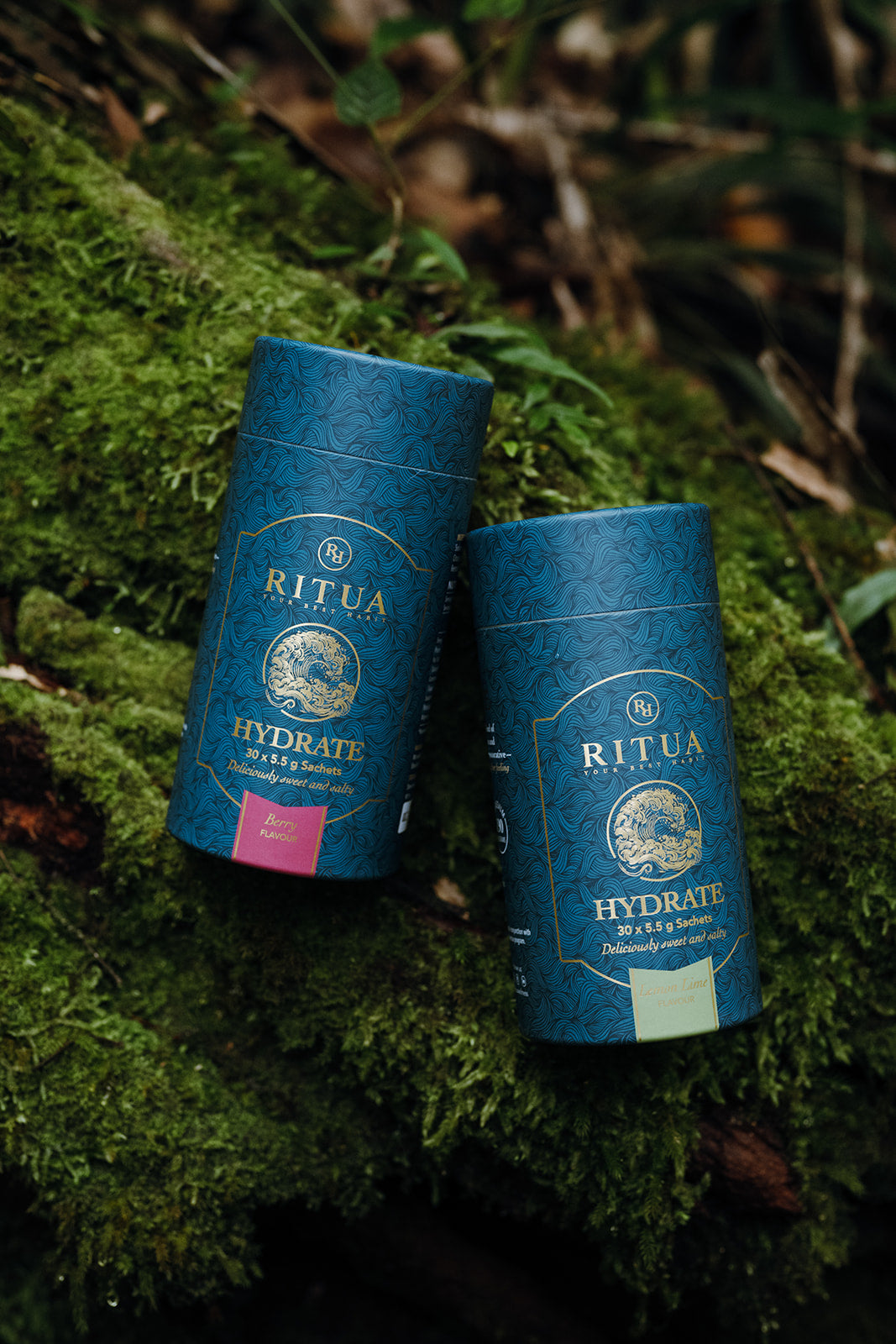 Berry and Lemon Lime Hydrate tubes resting on moss