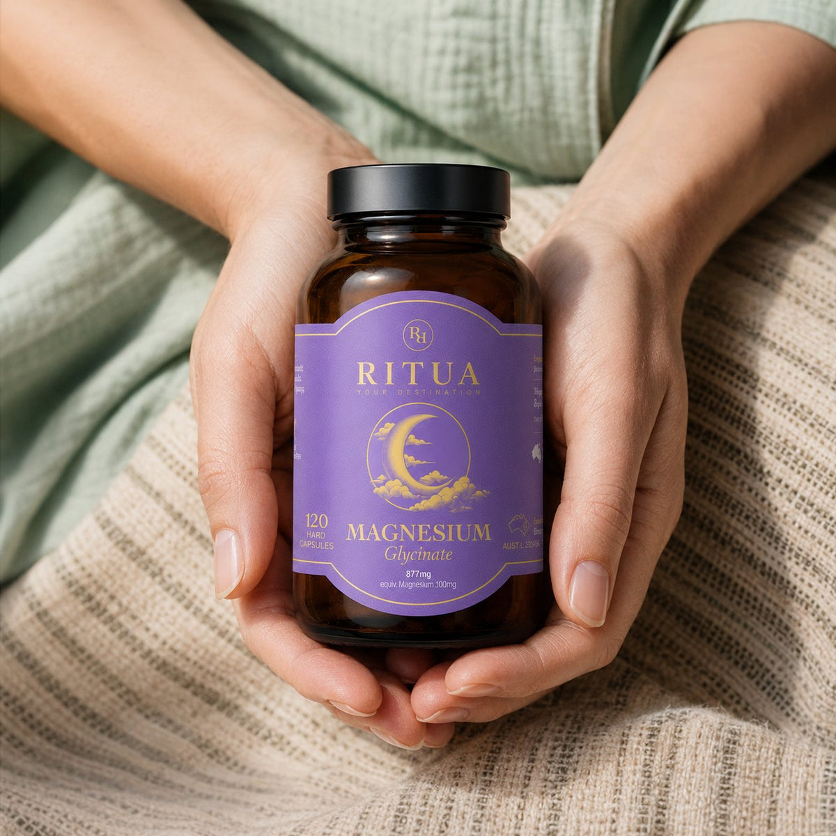 Ritua Magnesium Glycinate held in hands